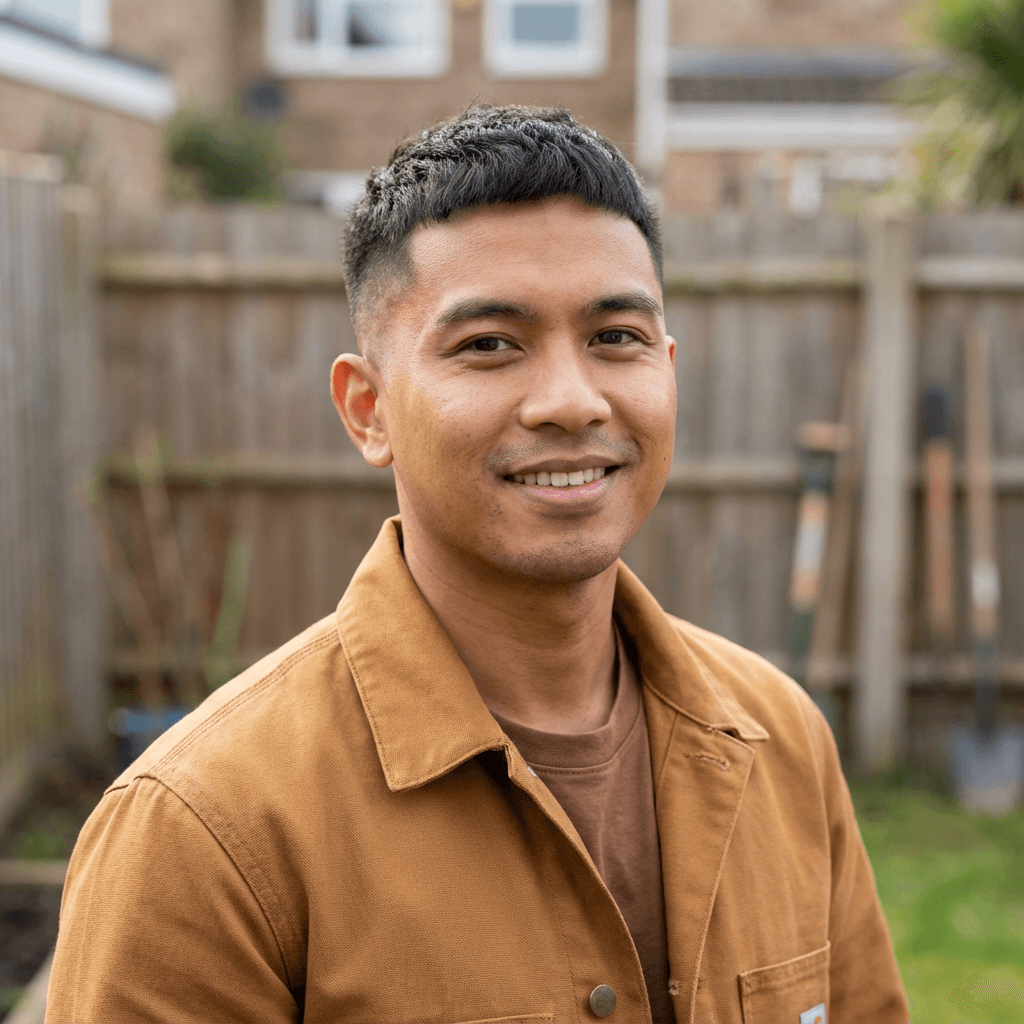 Robert Chang, property owner, standing on his newly maintained lawn